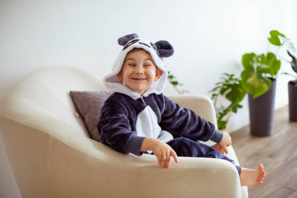 istock Portrait Of Smiling Boy Sitting 1315406982