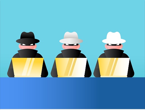 Hacking vector concept: portrait of three hackers wearing black, white, and gray hats typing on each of their golden laptops
