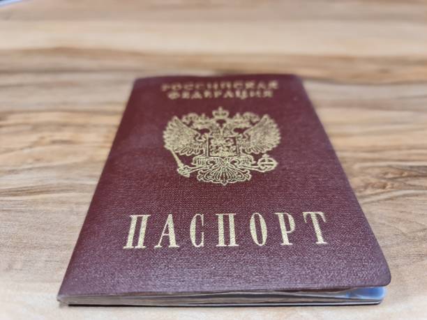 istock Russian passport. Passport on the train 1315411280