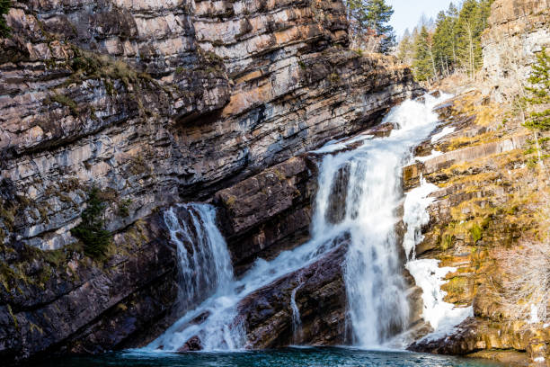 istock Cameron falls in late fall. Waterton Lakes National Park, Alberta, Canada 1315413733