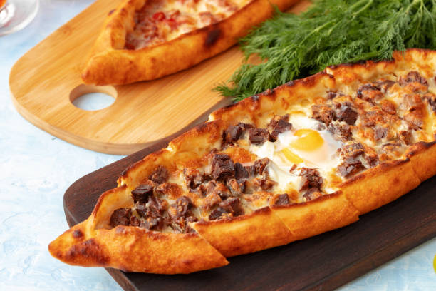 istock Close up of Turkish Pide bread on wooden table 1315415512