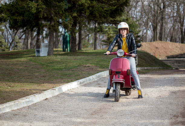 istock Urban girl on vespa 1315416265
