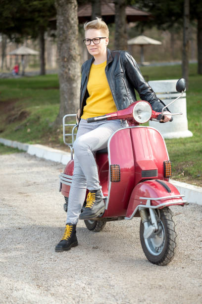 istock Urban girl on vespa 1315416287