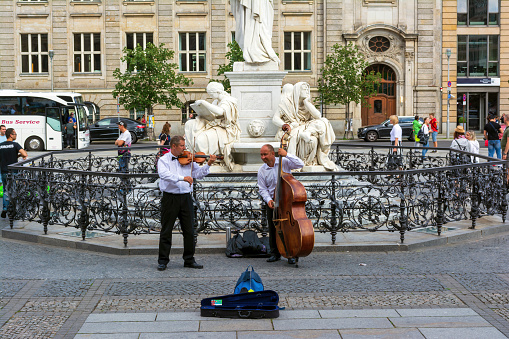 Berlin, Germany - August 13, 2019: Musicians in Gendarmenmarkt square in Berlin Germany