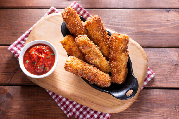 Mozzarella Sticks Fresh Mozzarella Sticks with Marinara Sauce Mozzarella Sticks stock pictures, royalty-free photos & images