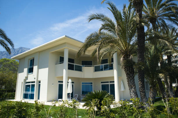 istock Modern house with terrace and pool. 3D rendering 1315420107