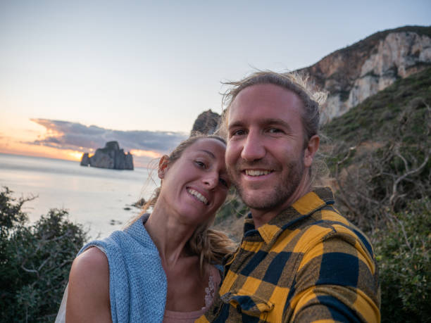 istock Couple take selfie at sunset, Sardinia 1315424297