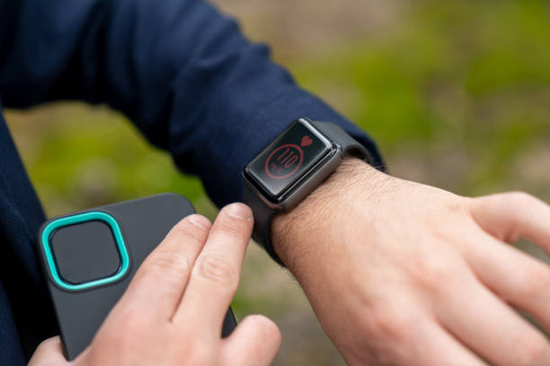istock Businessman on the go checking his glucose level on a smartwatch 1315426120
