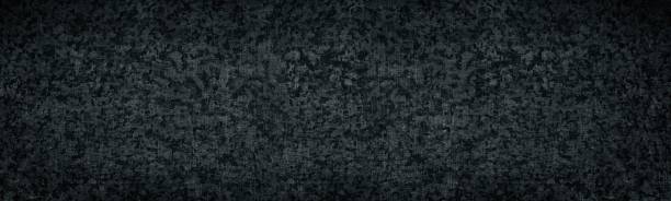 istock Old shabby iron metal wide black texture. Rough textured dark gray surface panorama. Abstract grunge large background 1315427775