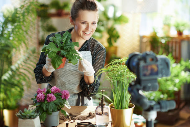 istock happy woman records gardening educational video tutorials 1315431208