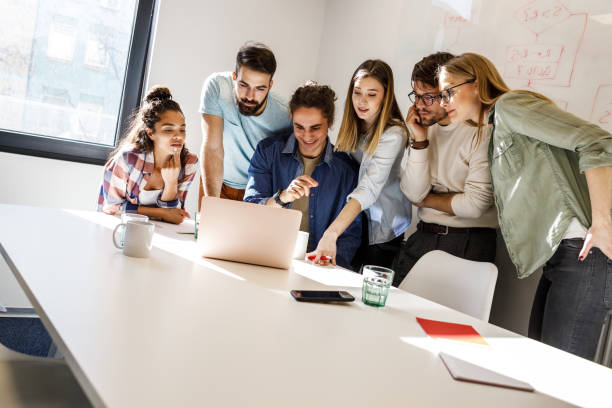 istock Group of programmers an designers in conference room.They discussing about development of new project. 1315431973