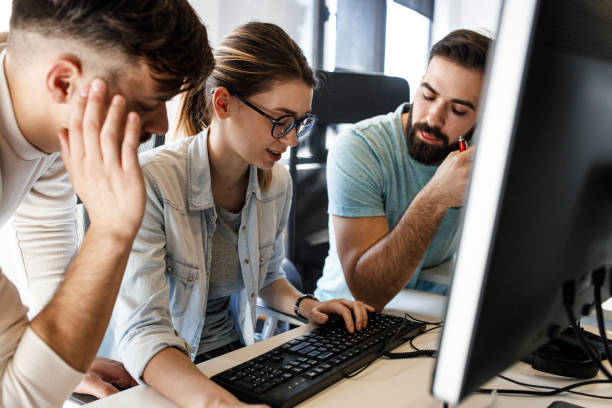 istock Group of designers programmers working on a new project at the office. 1315432710