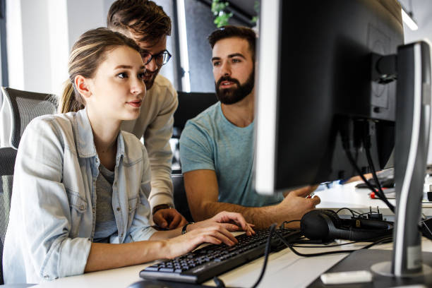 istock Group of designers programmers working on a new project at the office. 1315432799