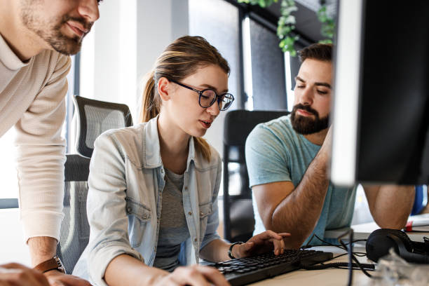 istock Group of designers programmers working on a new project at the office. 1315432821