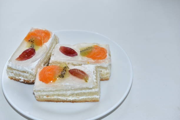 istock White fruit delicious cake on a white plate 1315440823