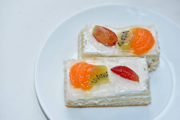 White fruit delicious cake on a white plate