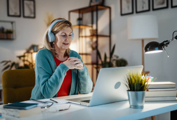 istock Mature woman doing finances at home 1315443052