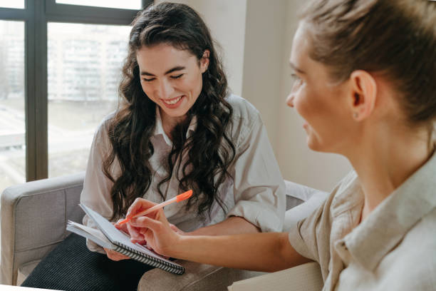 istock Two women discussing a new project indoor 1315443077
