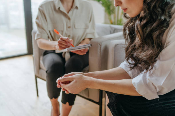 istock Young woman talking about her mental health problems 1315443155