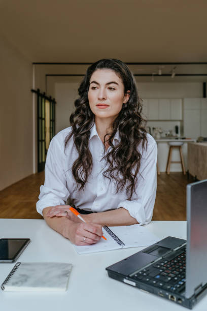 istock Business woman using laptop at office 1315443898