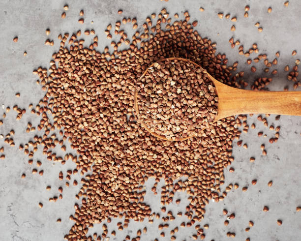istock Buckwheat in a wooden spoon. 1315446803