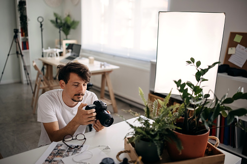 The photographer enjoys taking photos in his studio