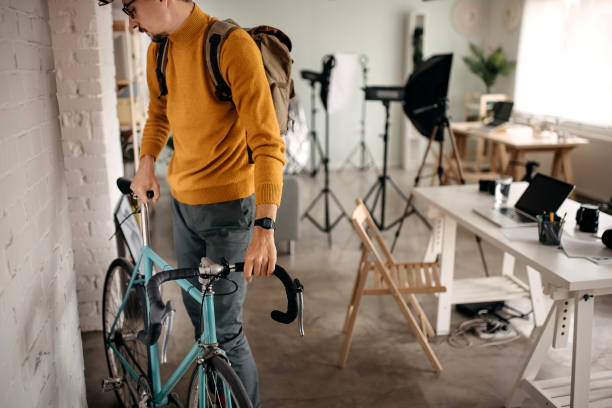istock The photographer comes to work by bicycle 1315452657