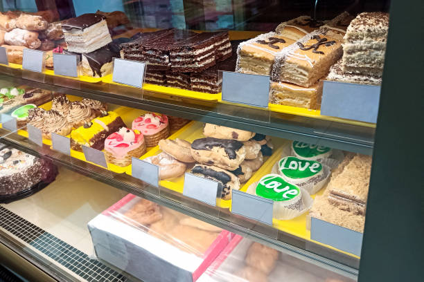 istock Various multicolored cakes on store shelves closeup 1315458039