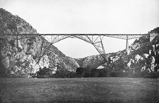 Blaauwkrantz Bridge at Makhanda (Grahamstown), South Africa. Vintage photo etching circa 19th century. On April 22, 1911 it would be the site of a horrific train disaster. At the time it was the worst accident South Africa had ever seen.