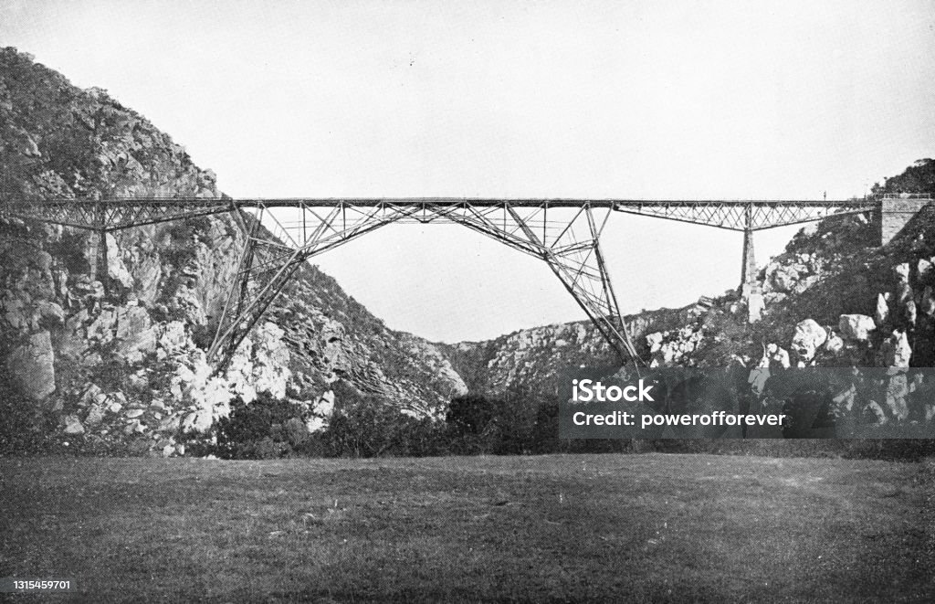 Blaauwkrantz Bridge at Makhanda, South Africa - 19th Century Blaauwkrantz Bridge at Makhanda (Grahamstown), South Africa. Vintage photo etching circa 19th century. On April 22, 1911 it would be the site of a horrific train disaster. At the time it was the worst accident South Africa had ever seen. 19th Century Stock Photo