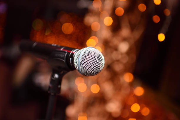 microphone on the background of a nightclub or karaoke stock photo