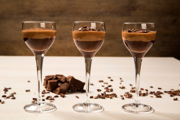 istock Chocolate mousse in a glasses on a wooden background 1315463286