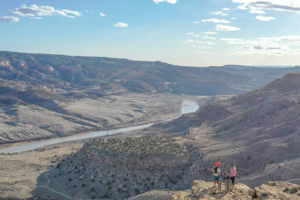 istock Aerial view of mountain bikers relaxing at viewpoint 1315463493