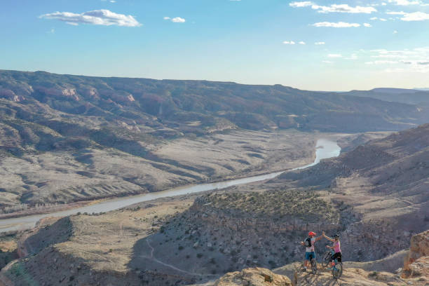 istock Aerial view of mountain bikers relaxing at viewpoint 1315463541