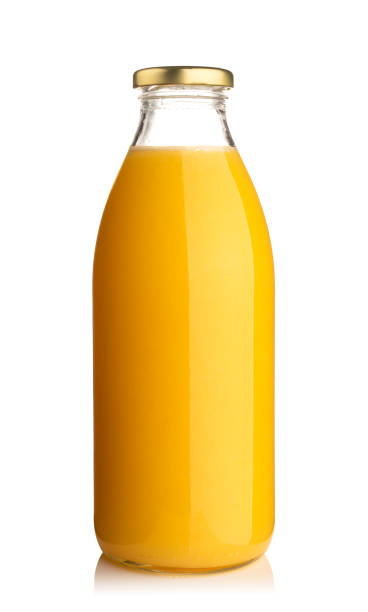 istock Front view of orange juice glass bottle isolated on white 1315466097