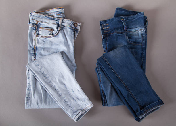 istock Fashion different jeans on gray background. 1315469045