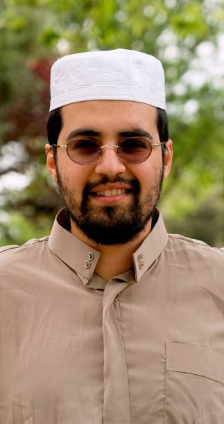 istock Smiling middle eastern bearded young man looking at the camera 1315469075