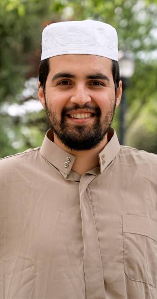 istock Smiling middle eastern bearded young man looking at the camera 1315469085
