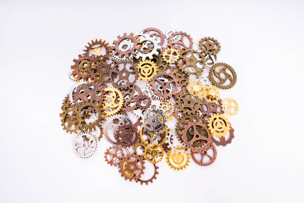 istock Pile of gear wheels and cogs in different colors 1315471174