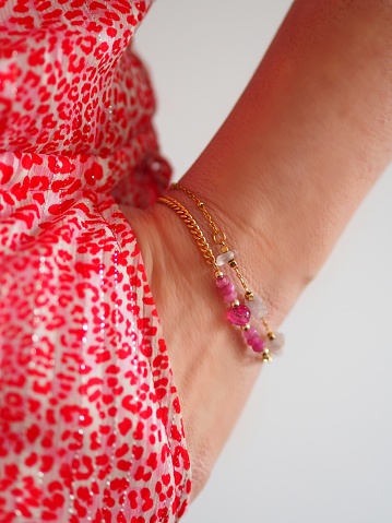 Rose Quartz and pink bead bracelet on a pink leopard dress