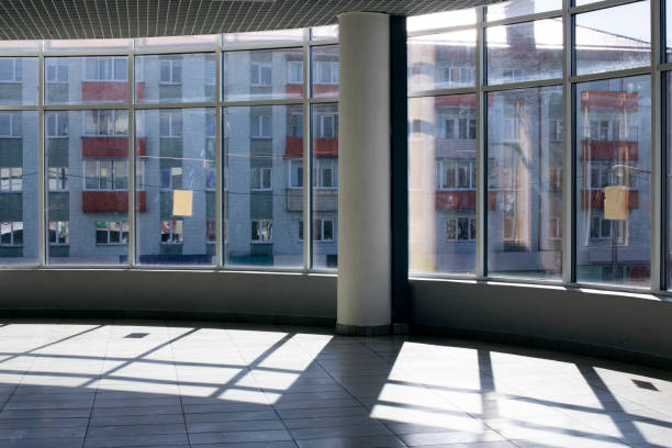 istock Light of sun in large windows in hall 1315479382