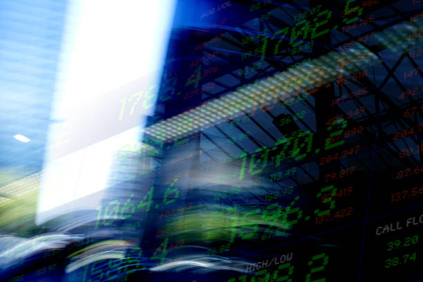 istock Financial Data over blurred Financial District Buildings 1315481845