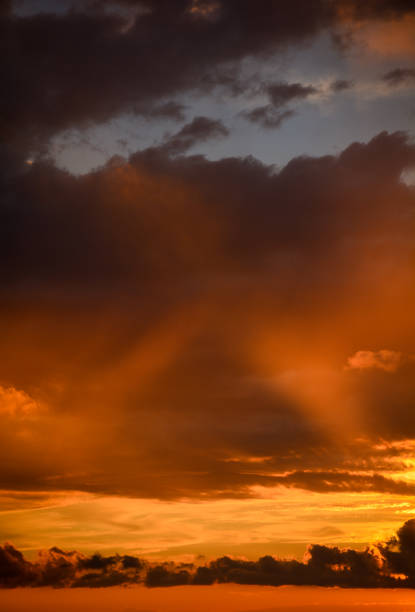 istock Dramatically illuminated clouds at sunset with cross in the middle 1315483513