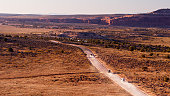 Camper Vans on Dead Horse Mesa Scenic Byway Near Moab, Utah - Drone