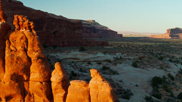 istock Red Evening Light Navajo Rocks with Shadows Beyond Near Moab, Utah - Aerial 1315485864