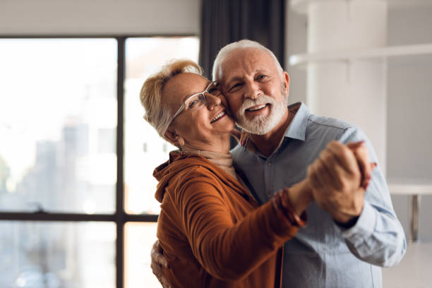 istock Happy senior couple  dancing at home 1315488084