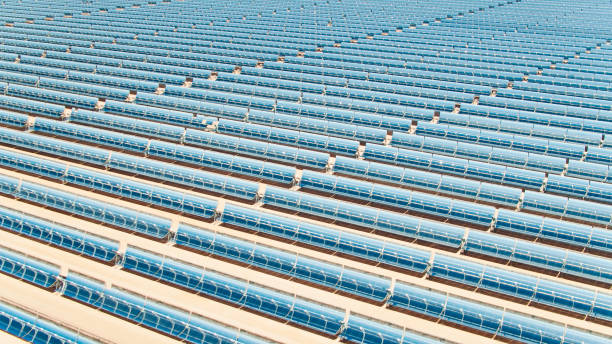 istock Desert Parabolic Mirrors at Solar Farm - Aerial 1315492340