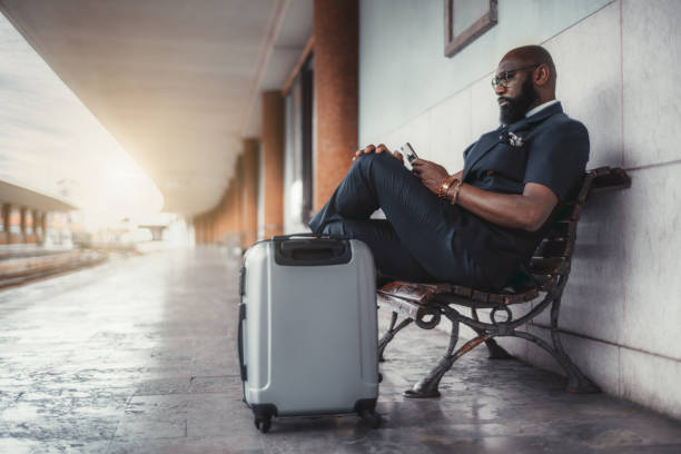 istock A black guy is waiting for the train 1315495626