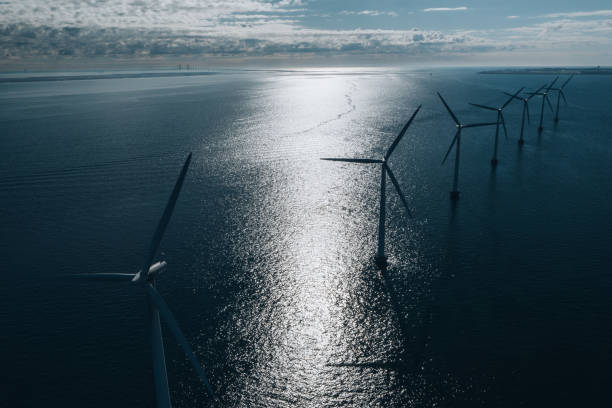 istock Wind turbines in the ocean 1315497050