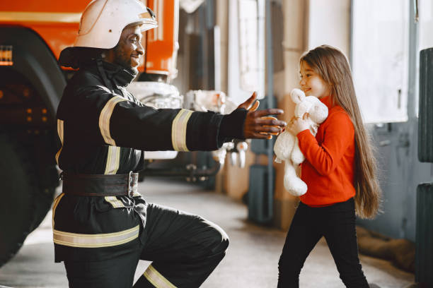 istock Portrait of a firefighter standing in front of a fire engine 1315502499